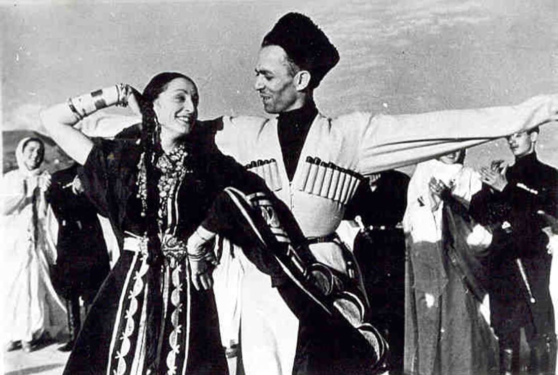 Archival photograph of the company’s founders performing